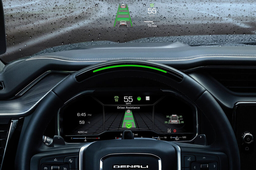 2026 GMC 시에라(5세대) 핸들 조작부와 HUD